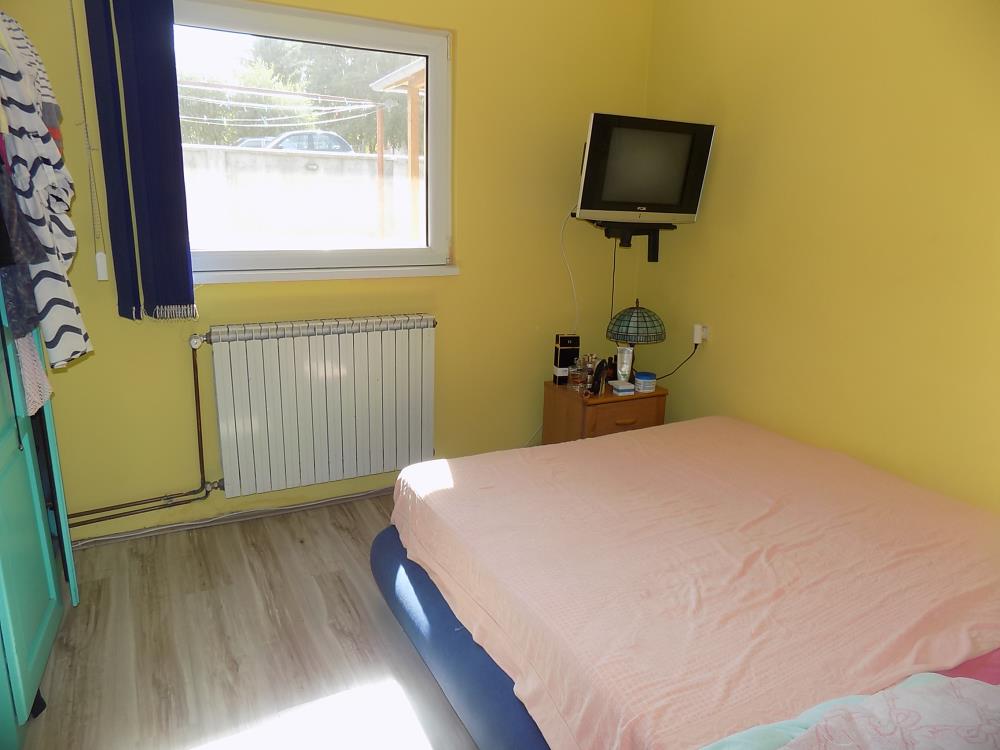Kuća sa letnjikovcem u dvorištu